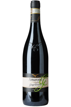Eine Flasche italienischer Bio Rotwein in einer Burgunderflasche mit einer schwarzen Kapsel.