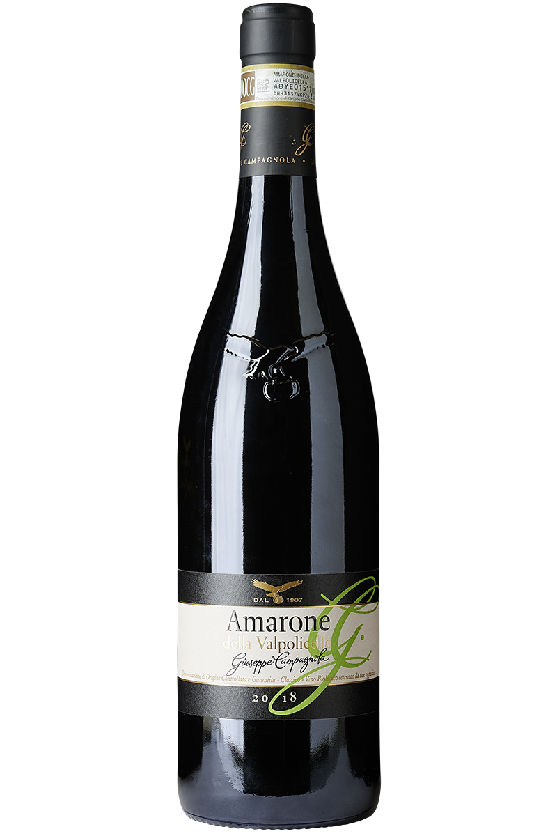 Eine Flasche italienischer Bio Rotwein in einer Burgunderflasche mit einer schwarzen Kapsel.