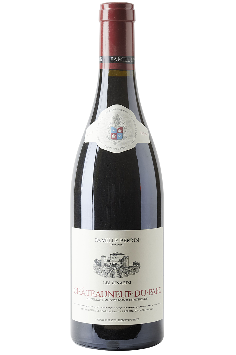 Eine Flasche französischer Rotwein Cuvee in einer Burgunderflasche mit einer roten Kapsel.