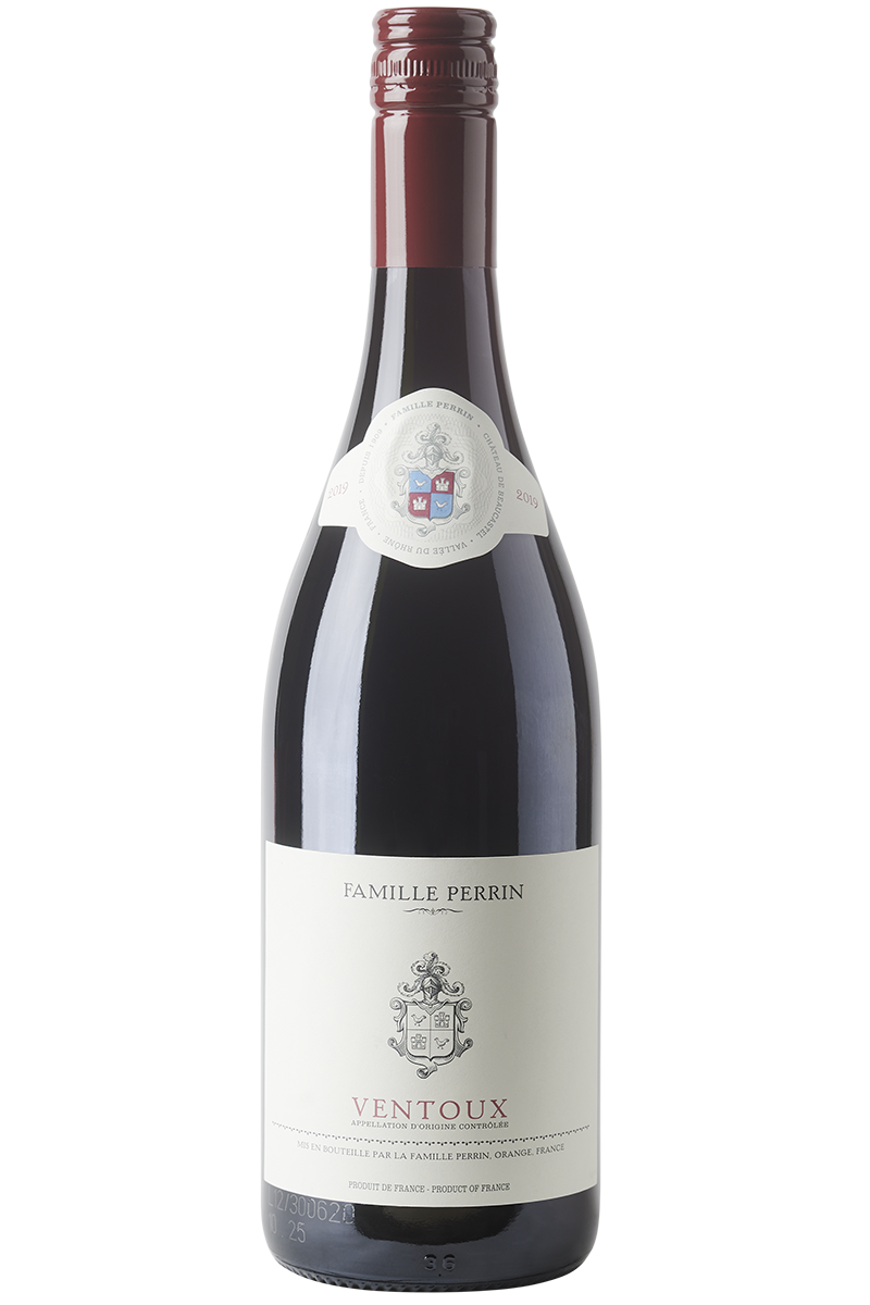 Eine Flasche französischer Rotwein Cuvée in einer Burgunderflasche mit einem roten Schraubverschluss.