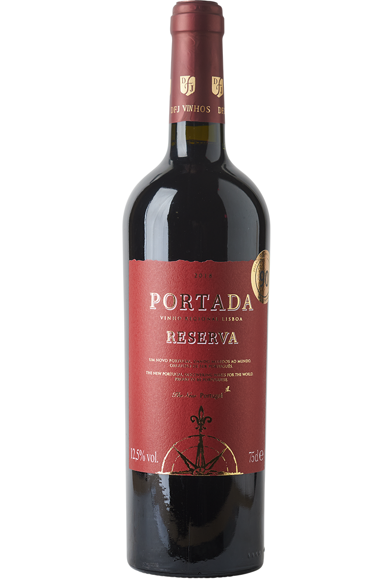 Eine Flasche portugiesischer Rotwein Cuvée in einer Bordeaux - Weinflasche mit einer roten Kapsel.