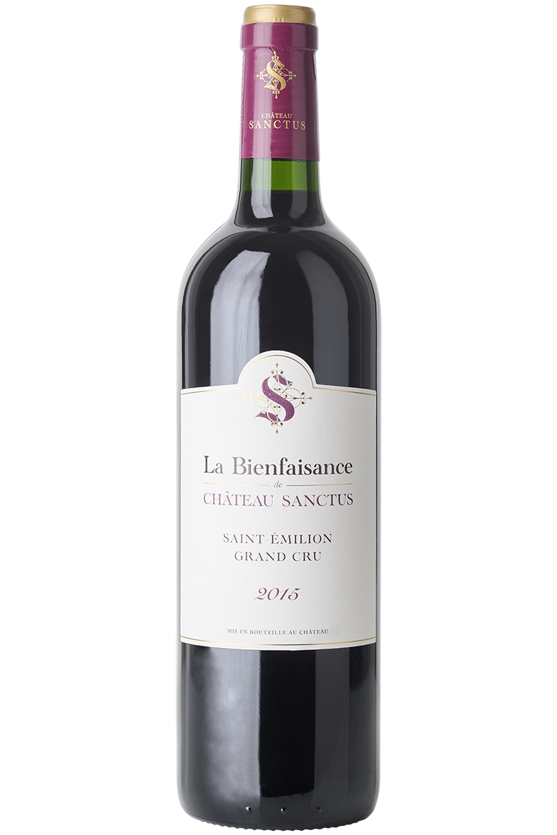 Eine Flasche französischer Rotwein in einer Bordeaux Flasche mit einer roten Kapsel.